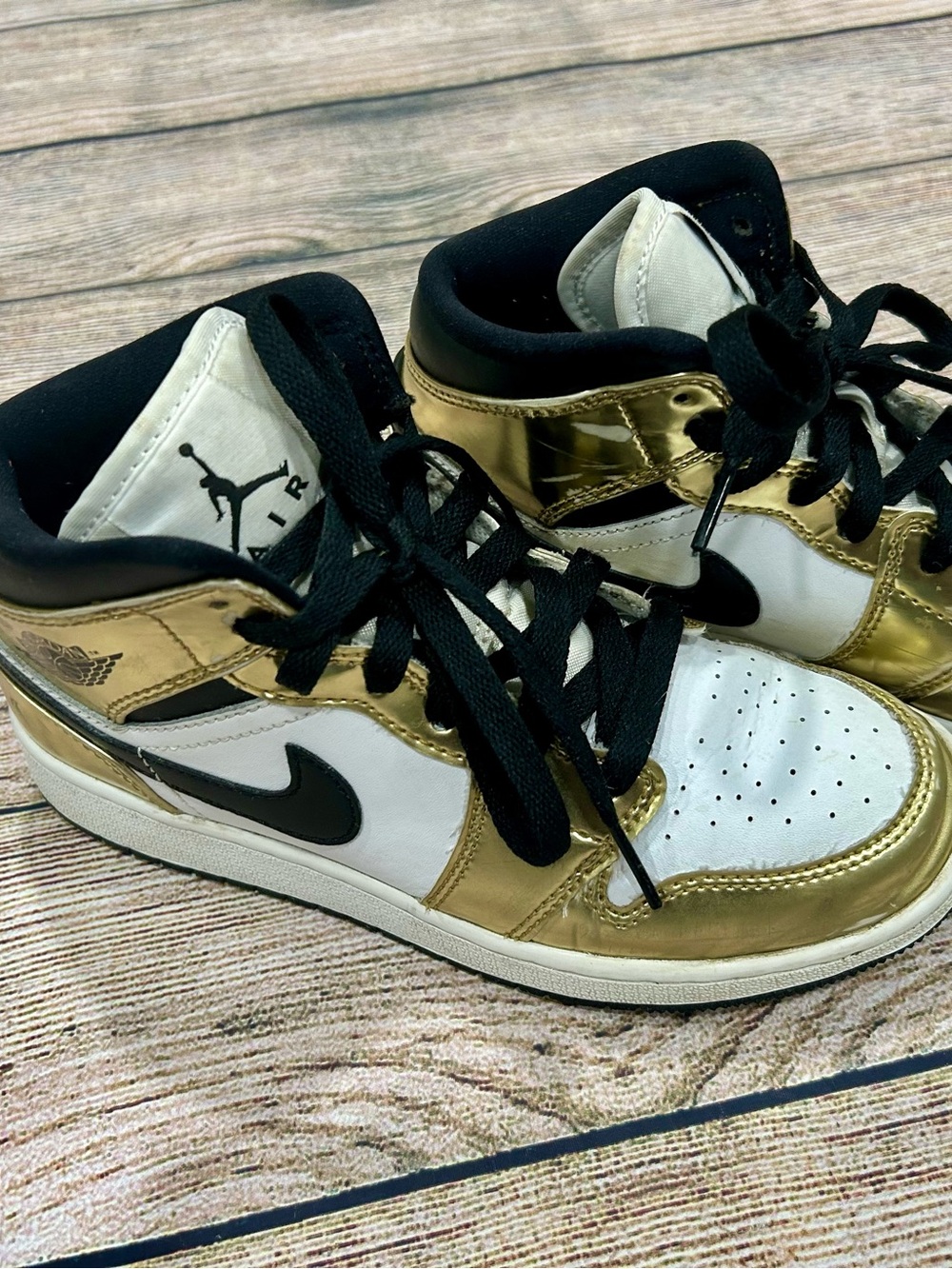 Nike Air Jordan Metallic Gold and Black Big Kids size 3.5 sneakers.